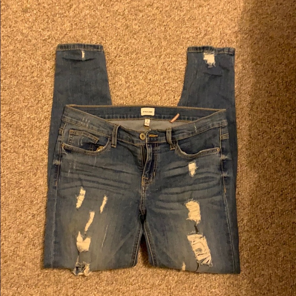 Sneak Peek Low Rise Distressed Skinny Jeans